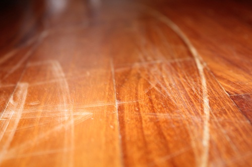 scratched wooden floor