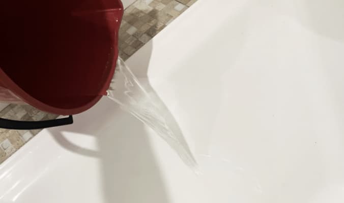 Electrodry Blog - 7 Steps to make your Bathtub Sparkle - Bucket of water
