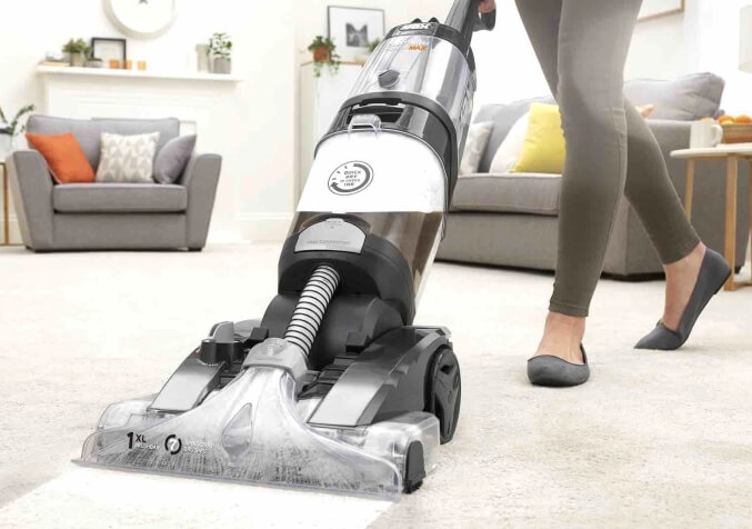 Woman using Carpet Shampooer