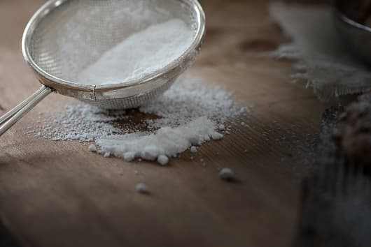 baking soda in strainer