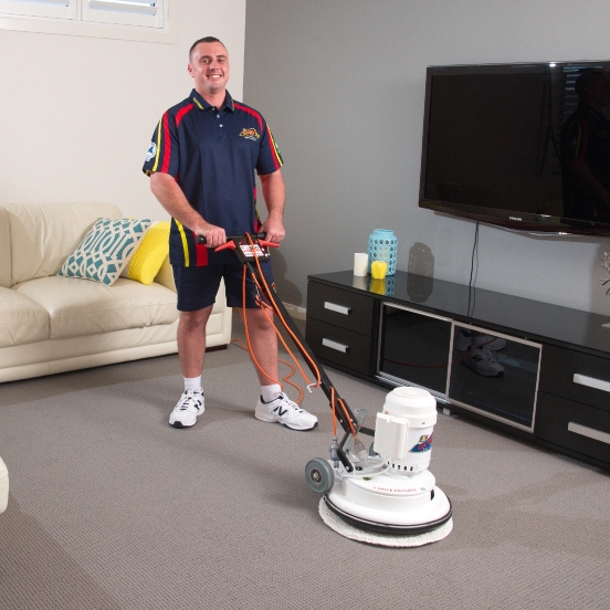 Technician Cleaning Carpet with Machine