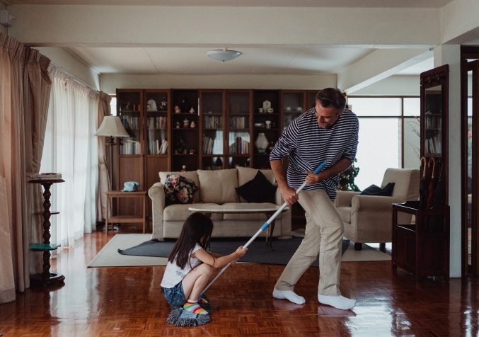 Father and Daughter Mopping
